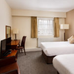 Classic twin bedroom at Mercure Perth Hotel, two single beds, desk, tv