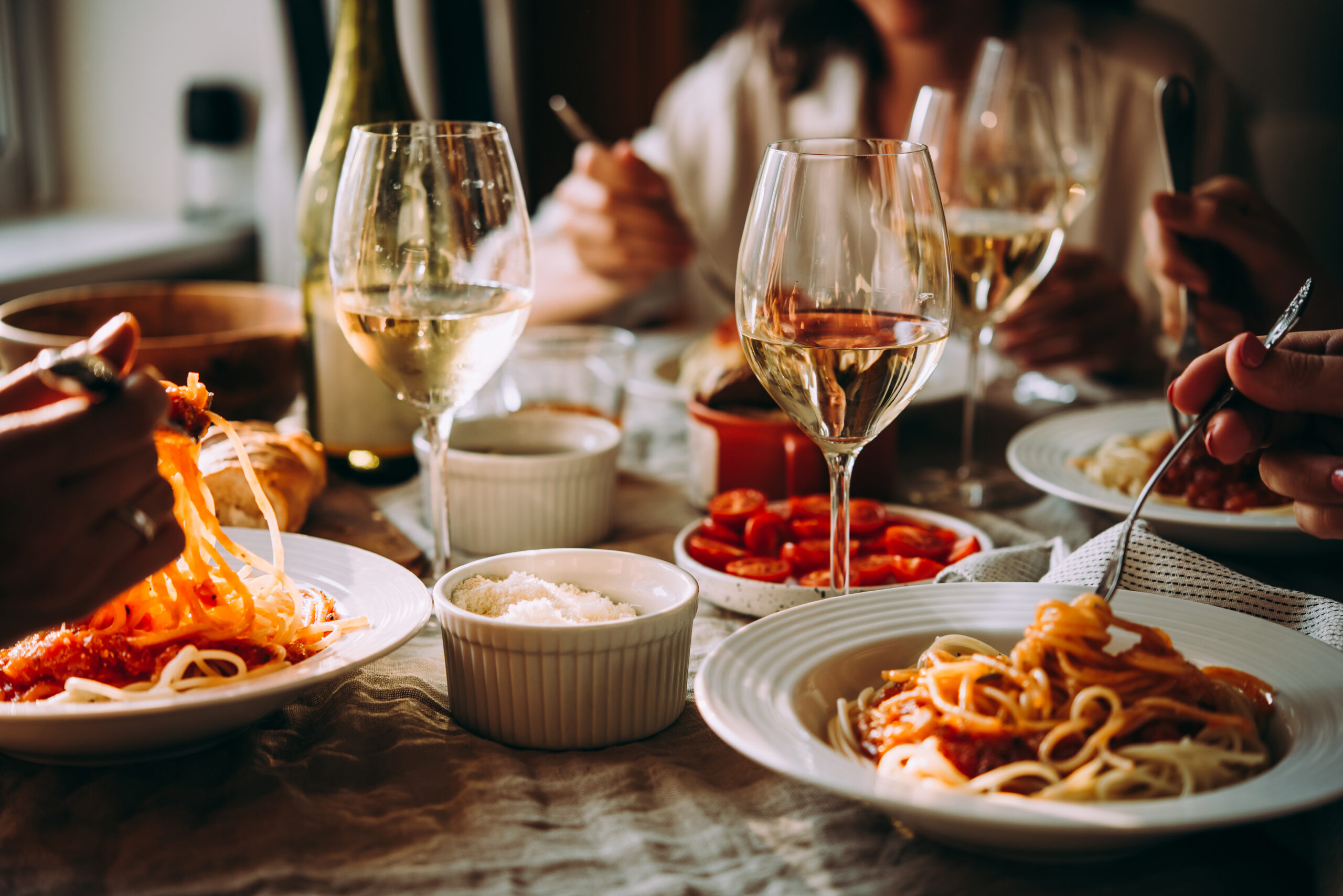 Friends,Having,A,Pasta,Dinner,At,Home,Of,At,A Couple christmas shopping