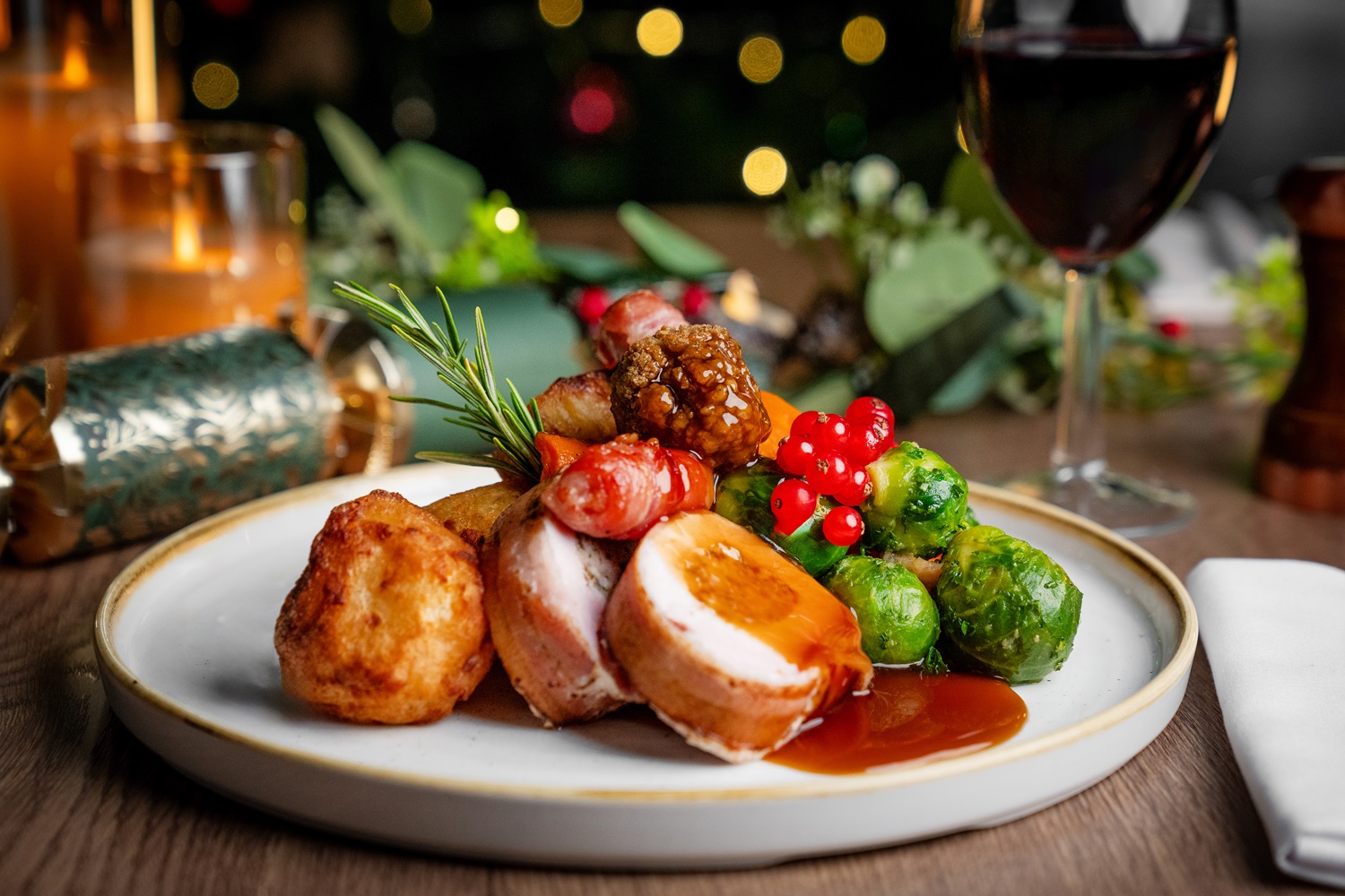 family sitting round or meal at restaurant